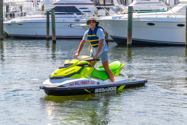 a man riding on a jetski in the water