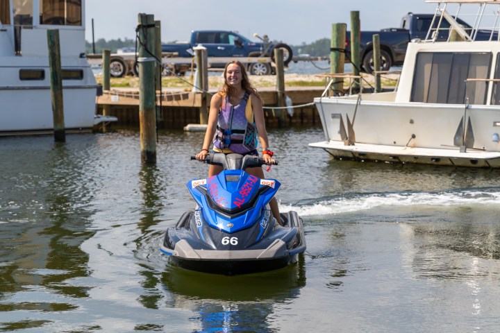 a person riding on a jetski in the water