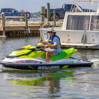a person riding on a jetski in the water