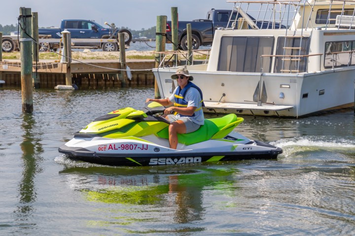 a person riding on a jetski in the water
